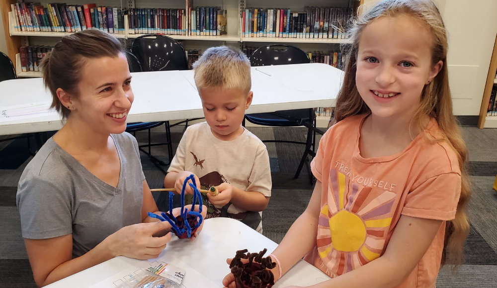 Lets go eeling curriculum at library with family acorn circle