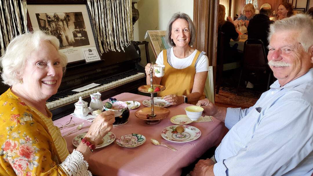 happy group at grandparents pioneer tea