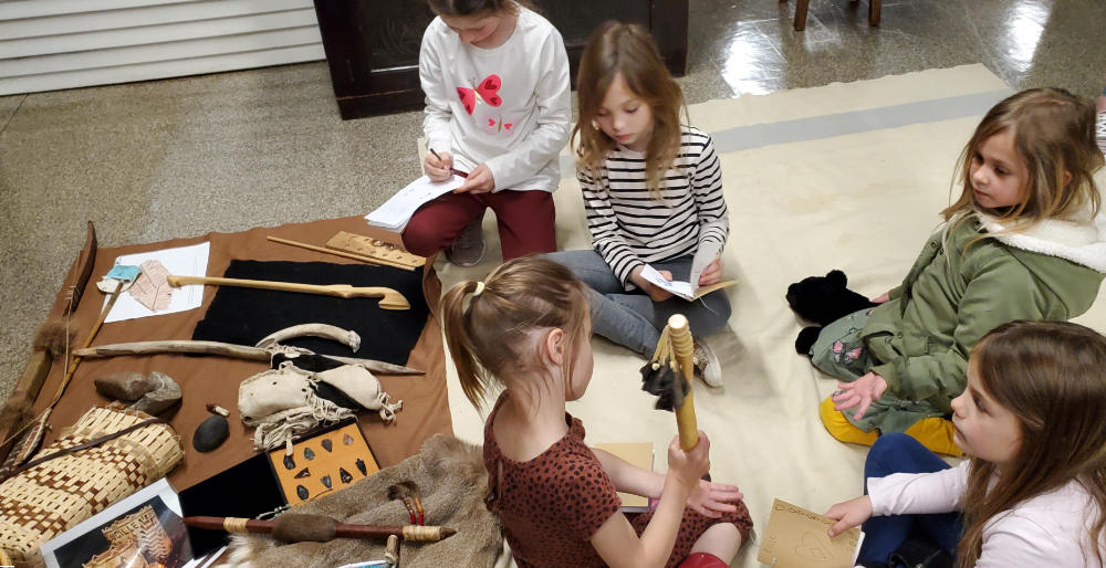 kids with Native items on field trip LCHM